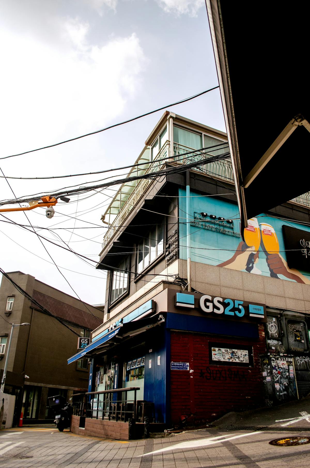 Urban street scene with GS25 convenience store in Itaewon Seoul