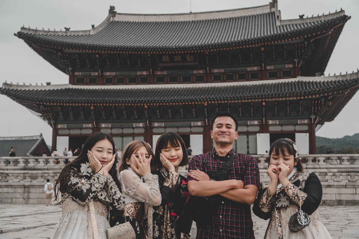 Tourists exploring Gyeongbokgung Palace Seoul South Korea